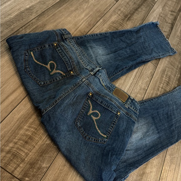 Dark wash Rocawear blue bootcut jeans with gold accents - Picture 1 of 7
